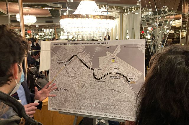 People look at one of the routes that's being proposed